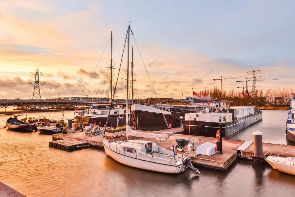 modern vessels near quay at sunset 2022 01 28 06 56 43 utc