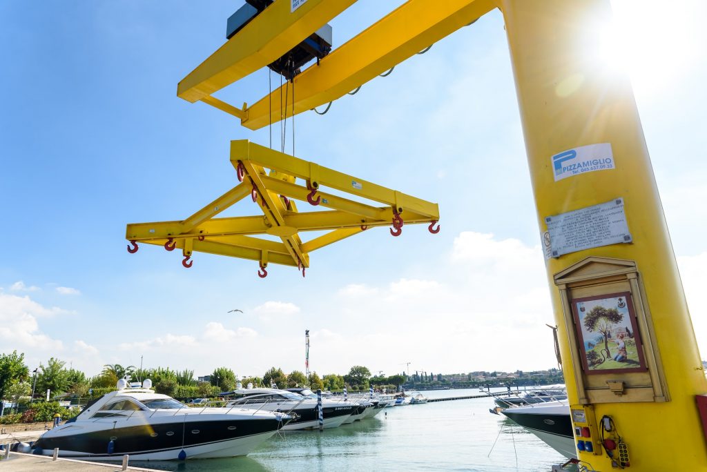 lifting boats in the marina.