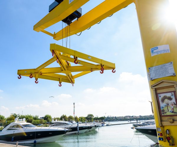 lifting boats in the marina.